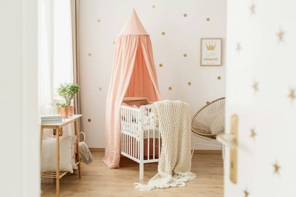 Open door to pink nursery