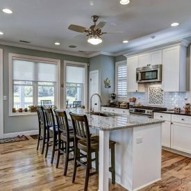 Beautiful kitchen interior with white cabinets.