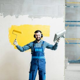 Painter listening to the music during the work